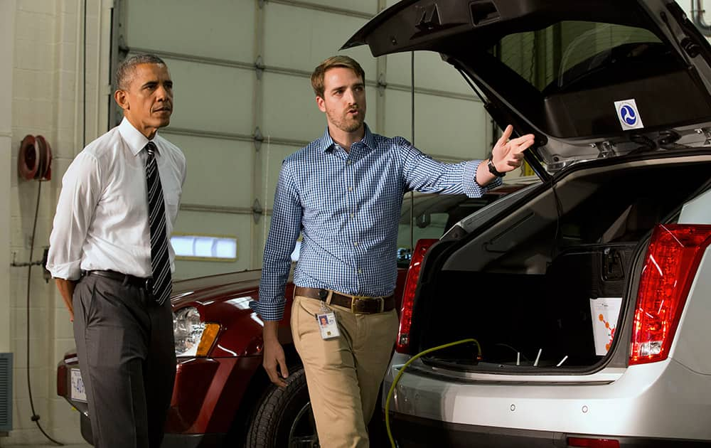 President Barack Obama tours Turner-Fairbank Highway Research Center with Taylor Lochrene, in McLean, Va.