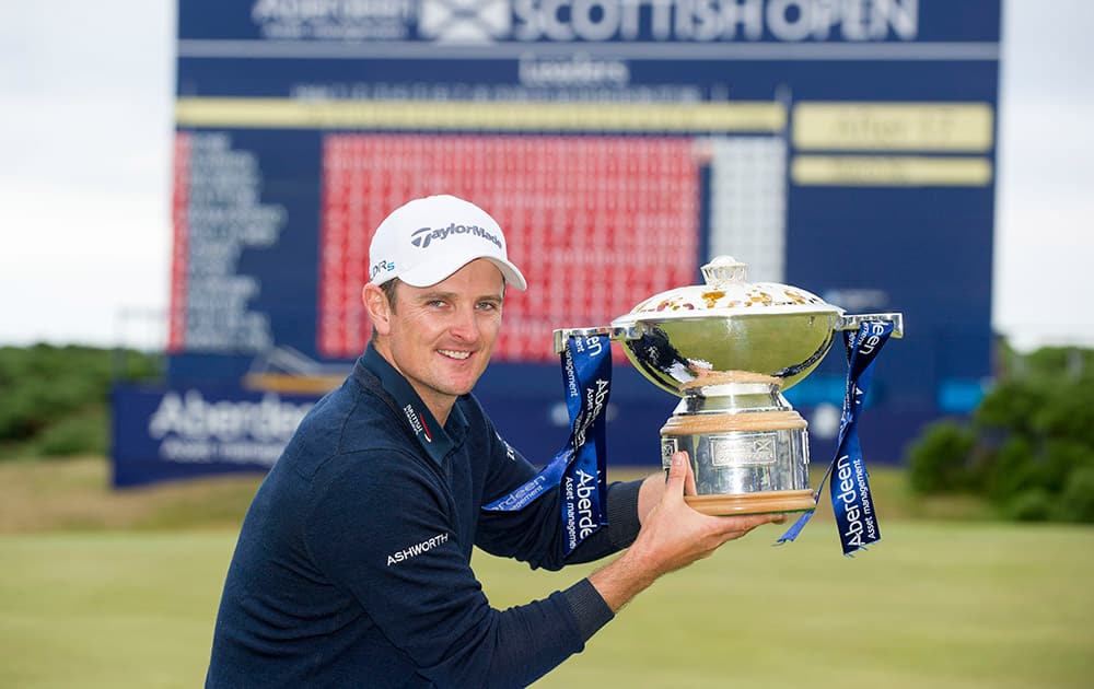 Justin Rose with the Scottish Open Trophy after winning the Scottish Open at Royal Aberdeen, Aberdeen, Scotland.