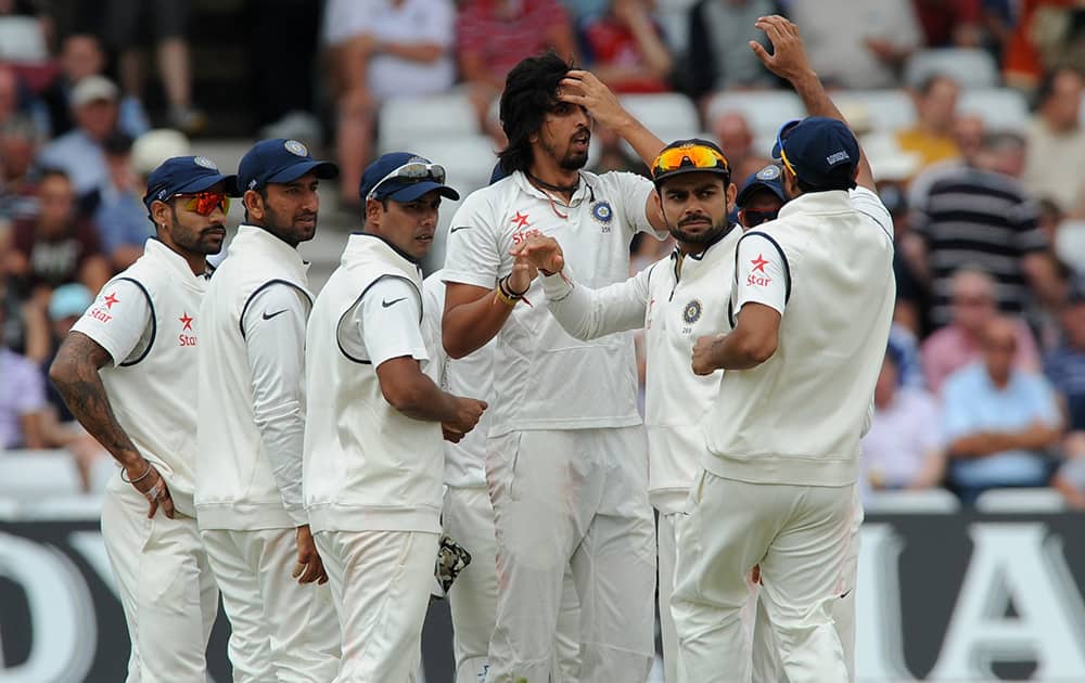 Ishant Sharma celebrates with team mates after getting England`s Sam Robson wicket LBW for 59 runs during day three of the first Test between England and India at Trent Bridge cricket ground, Nottingham, England.