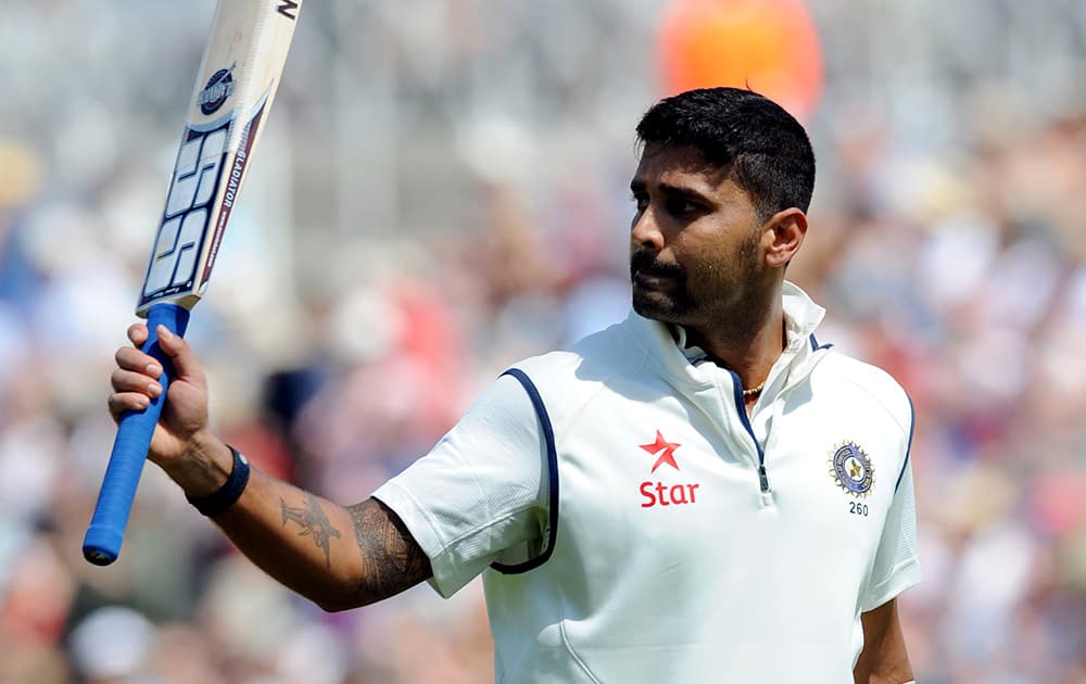 Murali Vijay acknowledges fans as he walks back to the pavilion after being given out lbw for 146 runs by England`s James Anderson during day two of the first Test between England and India at Trent Bridge cricket ground, Nottingham, England.