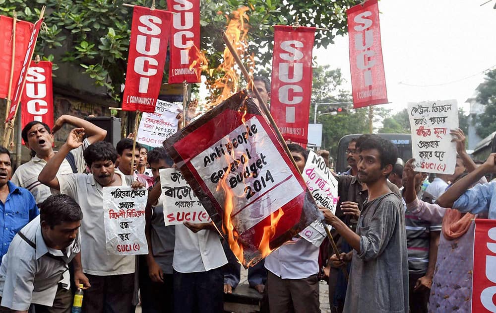 SUCI activists during a protest against Union Budget 2014 in Kolkata.