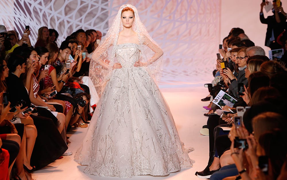 A model wears the wedding gown for Lebanese fashion designer Zuhair Murad`s fall-winter 2014-2015 Haute Couture fashion colllection in Paris.