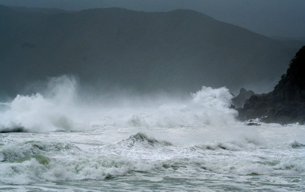 Waves crash against Wase beach area following the approach of Typhoon Neoguri in Amami Oshima, southern Japan.