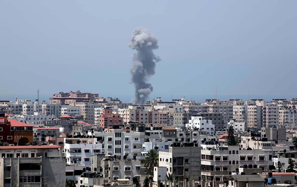 Smoke rises after an Israeli missile strike in Gaza City.