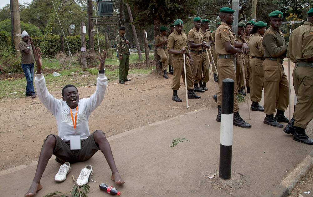 Watched by Kenyan National Youth soldiers a supporter of opposition Coalition for Reforms and Democracy or Cord shouts anti government slogans at Uhuru park in Nairobi.