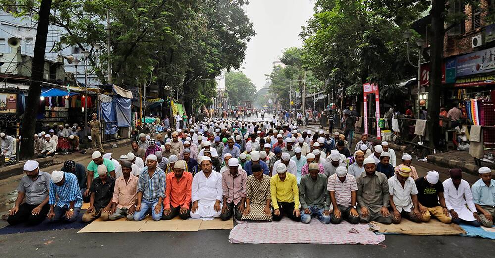 Indian Muslims offer prayers on the first Friday of Ramadan in Kolkata.