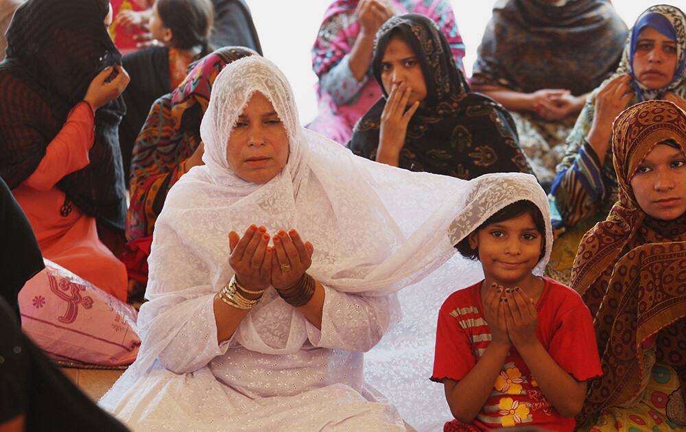 People offer Friday prayers at the Shahi Mosque in Lahore, Pakistan.