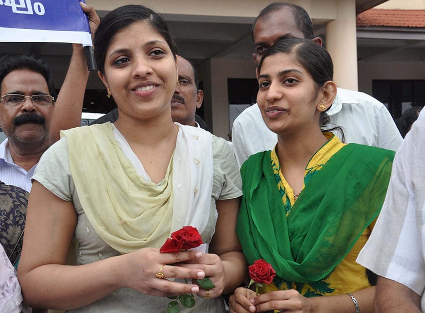 Two of the nurses who were stranded in the territory held by Islamic extremists in Iraq, upon arrival at the airport in Kochi.