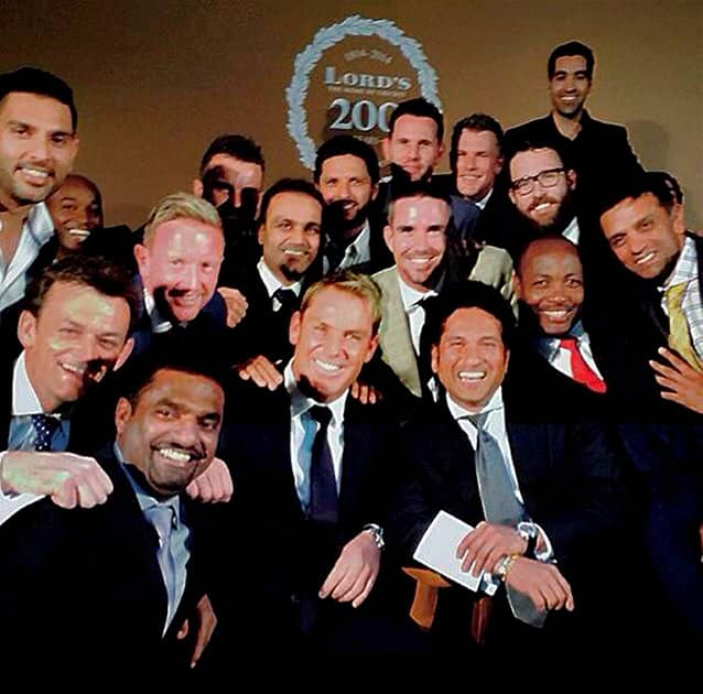 Cricket legend Sachin Tendulkar flanked by Brian Lara and Rahul Dravid on his left and Shane Warne and Muttiah Muralitharan on the right pose for the shutterbugs during a dinner party to celebrate bicentenary of Lord`s in London on Thursday. Also seen in the pciture are Yuvraj Singh, Virender Sehwag, Shahid Afridi, Adam Gilchrist and Kevin Pietersen. 