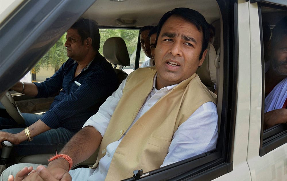 Police detain BJP MLA Sangeet Som on his way to attend the party`s Mahapanchayat at Kanth, near Moradabad.