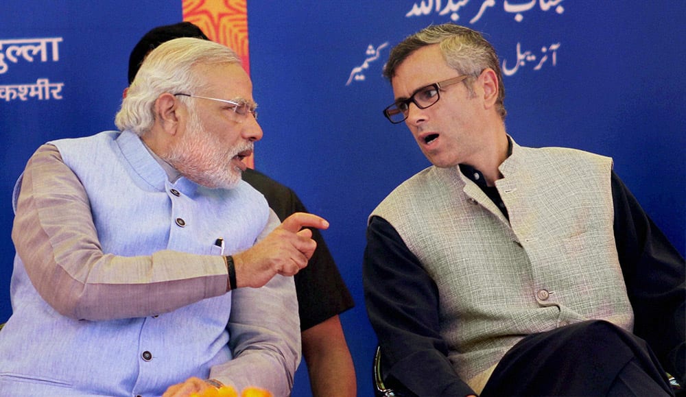 Prime Minister Narendra Modi with Jammu & Kashmir Chief Minister, Omar Abdullah during the flag off ceremony of the first train (Shri Shakti Express) to Udhampur, from Katra Railway Station.