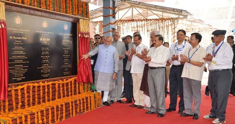 The Prime Minister, Shri Narendra Modi dedicating the newly constructed railway line between Shri Mata Vaishno Devi Katra-Udhampur Section to the Nation by unveiling the plaque, at Shri Mata Vaishno Devi Katra Railway Station, in Jammu and Kashmir. (Pic Courtesy: PIB)