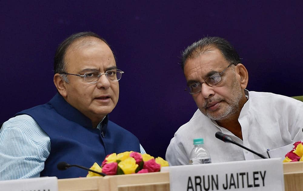 Union Minister for Finance Arun Jaitley with Agriculture Minister Radha Mohan Singh during the State Food Ministers Conference in New Delhi.