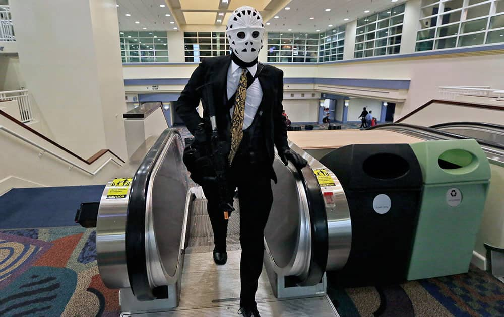 Frank Hernandez, 17, of Miami, wears a outfit depicting the character Waingrow from the film Heat, while attending Florida Supercon.