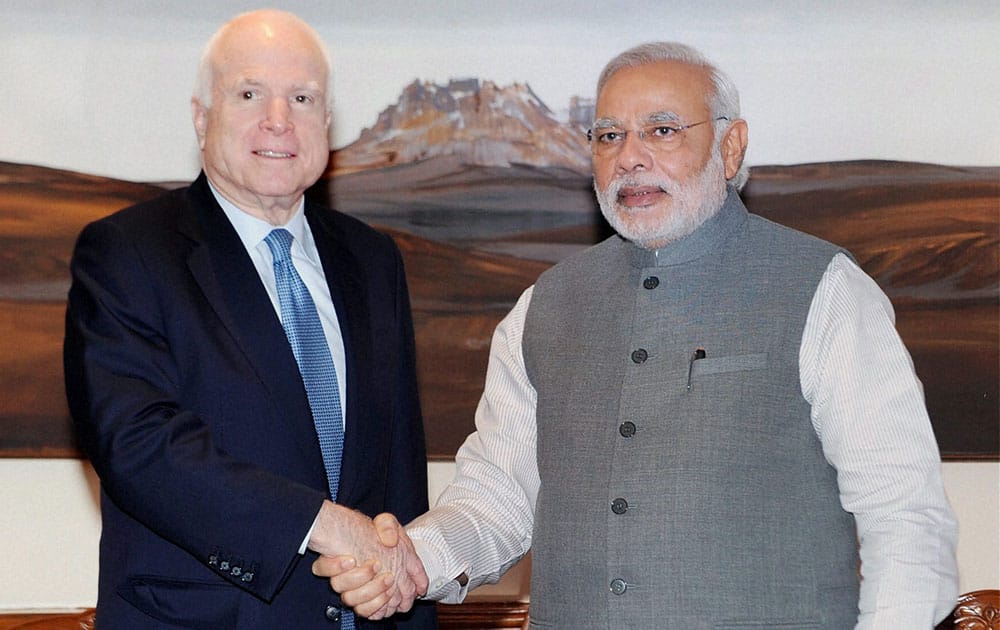 Prime Minister Narendra Modi with US Senator, John McCain at a meeting in New Delhi.