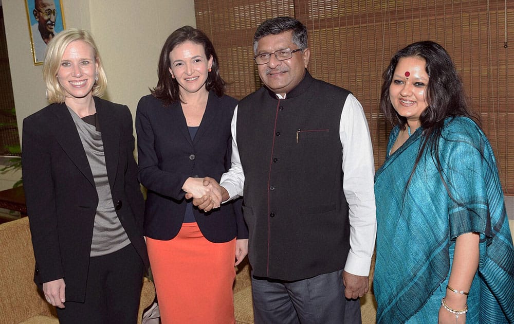 Communications and IT Minister Ravi Shankar Prasad shakes hands with COO, Facebook Sheryl Sandberg, during a meeting in New Delhi.