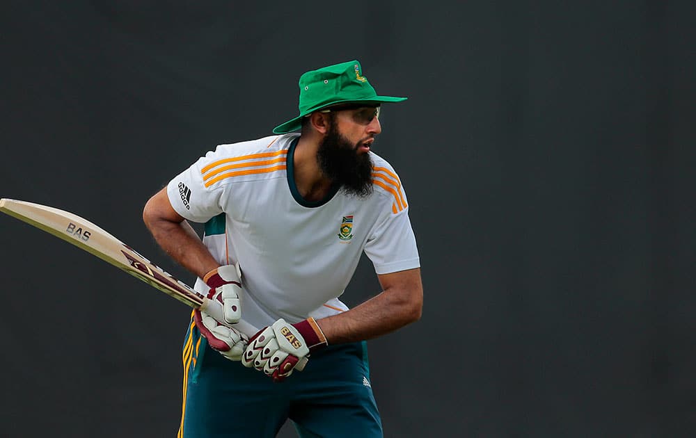 South African test cricket captain Hashim Amla, practises his stance during a training session before their warm up game against Sri Lanka Board XI in Moratuwa on the outskirts of Colombo, Sri Lanka.