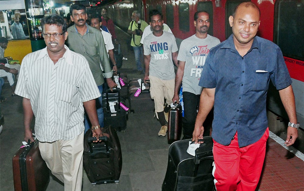 Indians who were trapped in Iraq, on their arrival at the Kozhikode Railway Station.