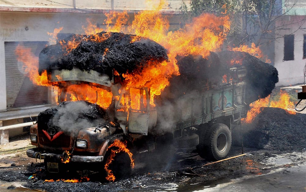 A truck in flames in Beawar, Rajasthan.