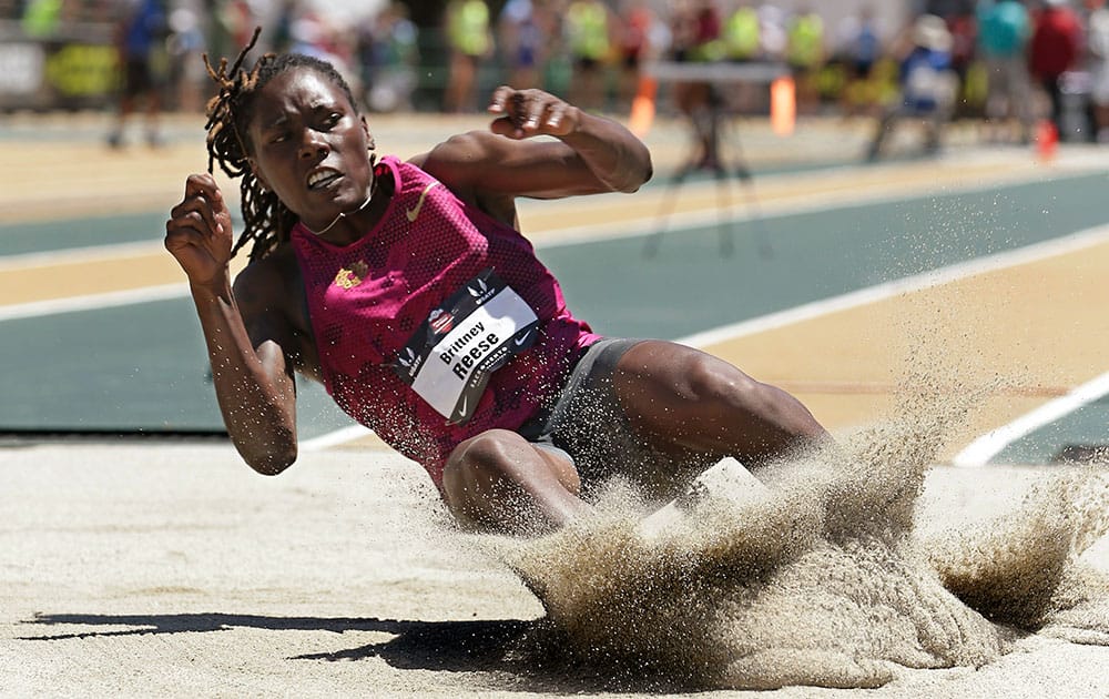 Brittney Reese lands in the pit during the women`s long jump at the U.S. outdoor track and field championships, in Sacramento, Calif. Reese won with a jump of 22 feet, 8 1/2 inches.