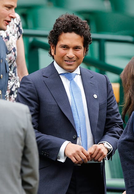 Sachin Tendulkar arrives in the Royal Box on centre court at the All England Lawn Tennis Championships in Wimbledon, London.