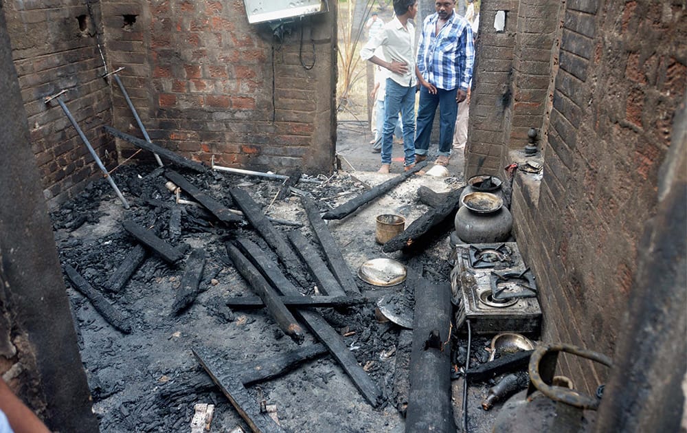 Charred articles at a house in Nagaram village after GAIL gas leak fire near Rajahmundry in East Godavari district of Andhra.