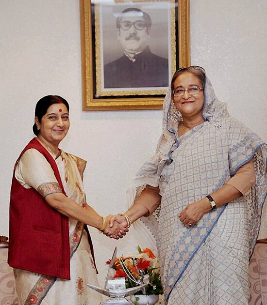 Indian External Affair Minister Sushma Swaraj, left and Bangladesh Prime Minister Sheikh Hasina pose for photographs during their meeting in Dhaka, Bangladesh.