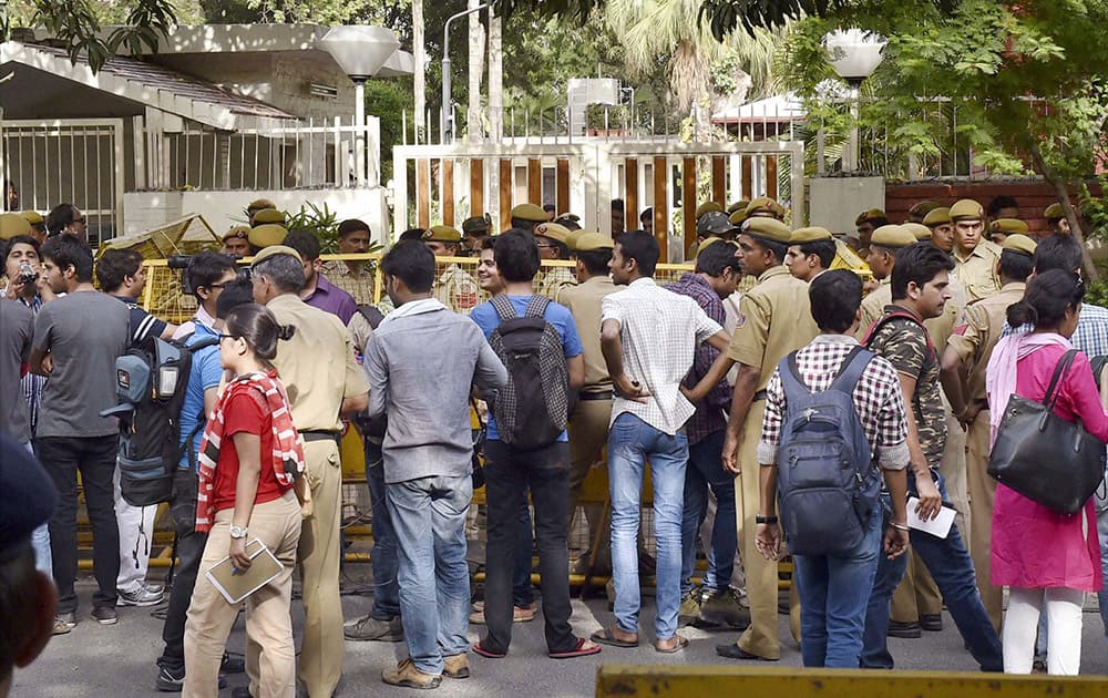 Media and security outside the residence of Delhi University VC Dinesh Singh in New Delhi.