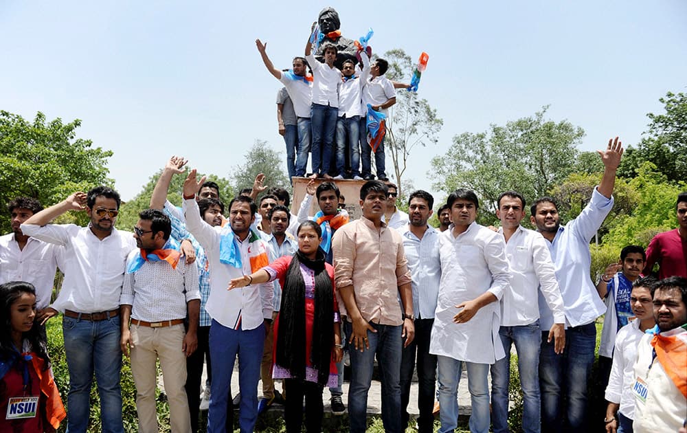 NSUI activists shout slogans during a protest over controversial FYUP at Delhi University campus.