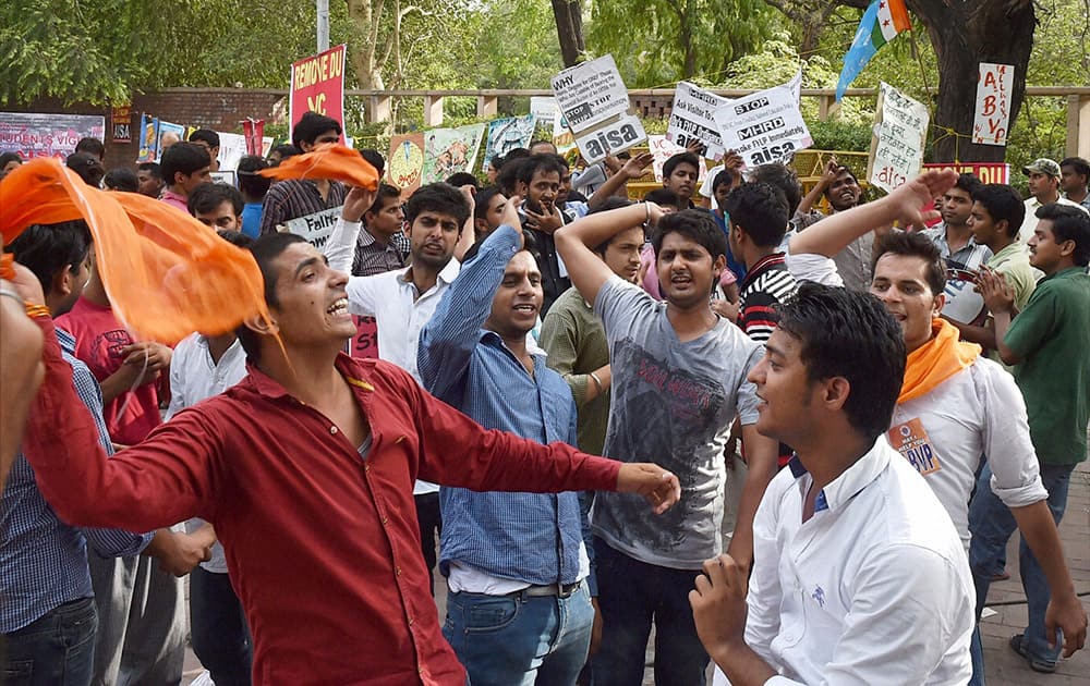 Students shout slogans during a protest over controversial FYUP at Delhi University campus.