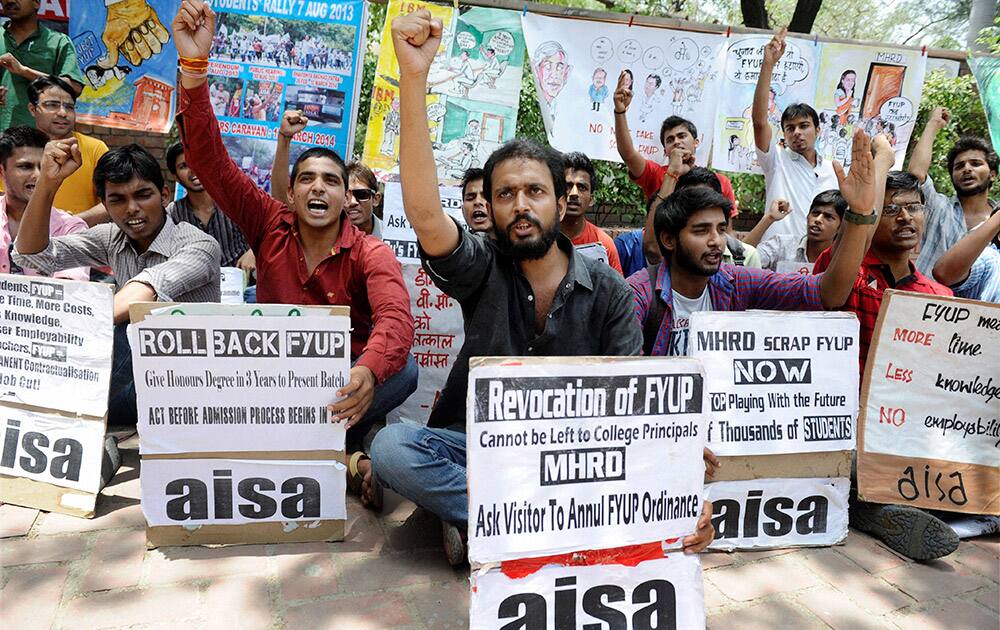 AISA activists shout slogans during a protest over controversial FYUP at Delhi University campus.