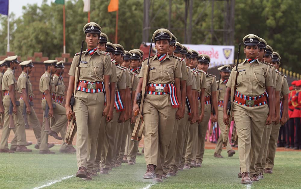 Indian women police officers march during their passing out parade at Gujarat Police Academy near Gandhinagar.