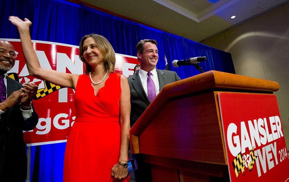 Gubernatorial candidate Attorney General Douglas Gansler, right, accompanied by Lt. Governor candidate House Delegate Jolene Ivey, speaks to supporters during an election night part in North Bethesda, Md.