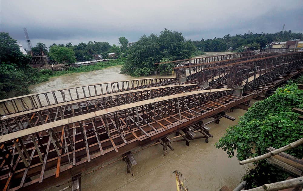 A view of the collapsed wooden bridge over the Howrah River in Agartala.