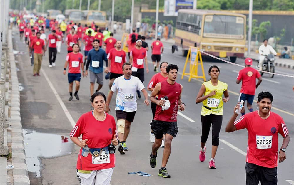 Participants during the Half Marathon 2014 for fight against depression and prevention of suicides in Chennai.