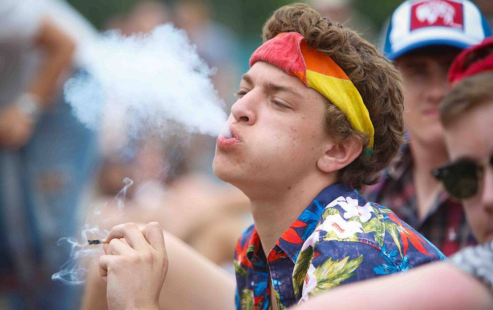 People watch as members of Lucius perform during the third day of Firefly Music Festival at The Woodlands in Dover, Del.