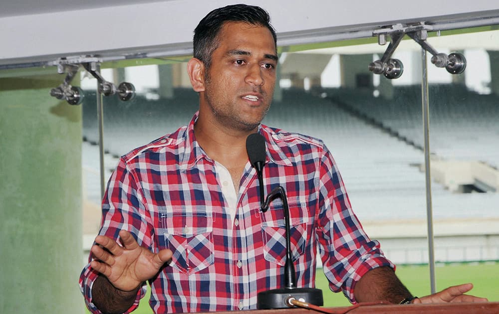 Cricket skipper Mahendra Singh Dhoni addresses the inaugural ceremony of Country Cricket Club at JSCA stadium complex in Ranchi.