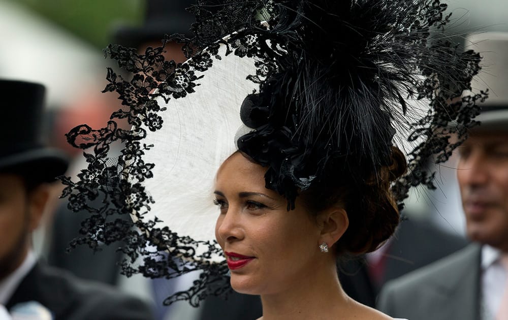 Princess Haya of Jordan wears an ornate hat in the parade ring on the third day of the Royal Ascot horse racing meeting, which is traditionally known as Ladies Day, at Ascot, England.