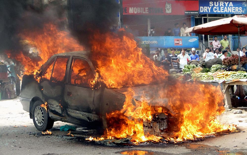 A car catches fire in Vasundhra in Ghaziabad.