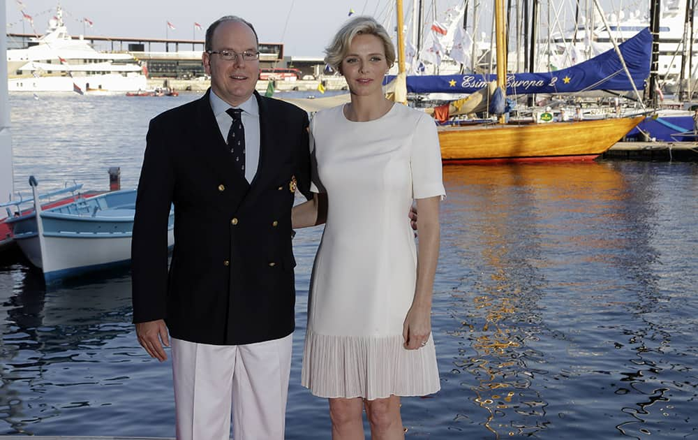 Prince Albert II of Monaco, left, and his wife Princess Charlene pose, during the inauguration of the Yacht Club de Monaco’s new building.