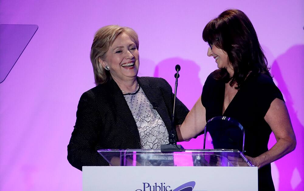 Former Secretary of State Hillary Rodham Clinton is greeted by actress Mary Steenburgen during the Public Counsel’s William O. Douglas awards dinner in Los Angeles. 