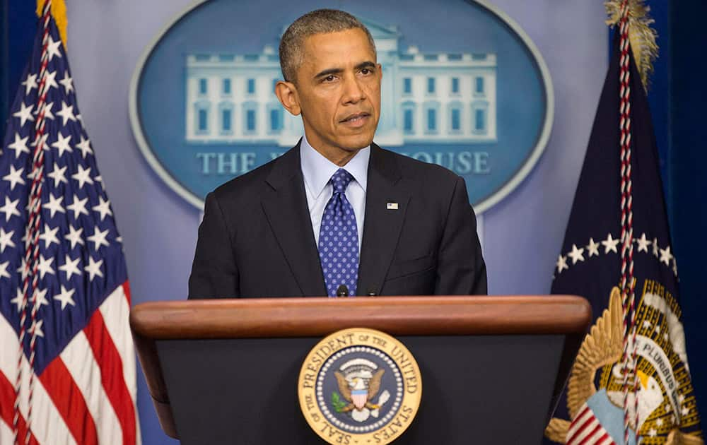 President Barack Obama speaks to members of the media about the situation in Iraq.