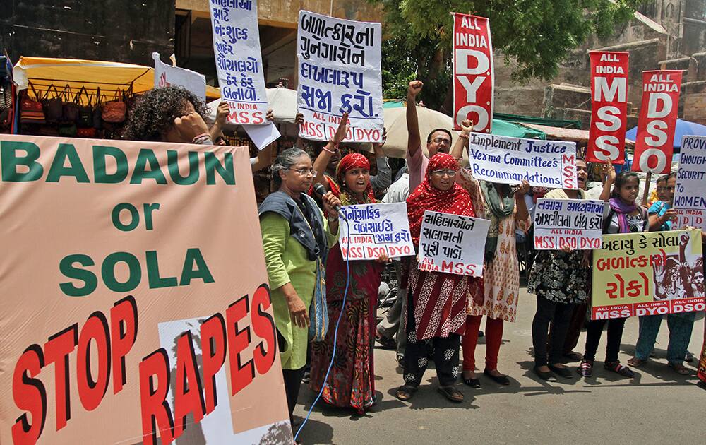 Members of All India Mahila Sanskritik Sangathan shout slogans as they protest against increasing number of rape and other attacks on women and girls in the country, in Ahmedabad.