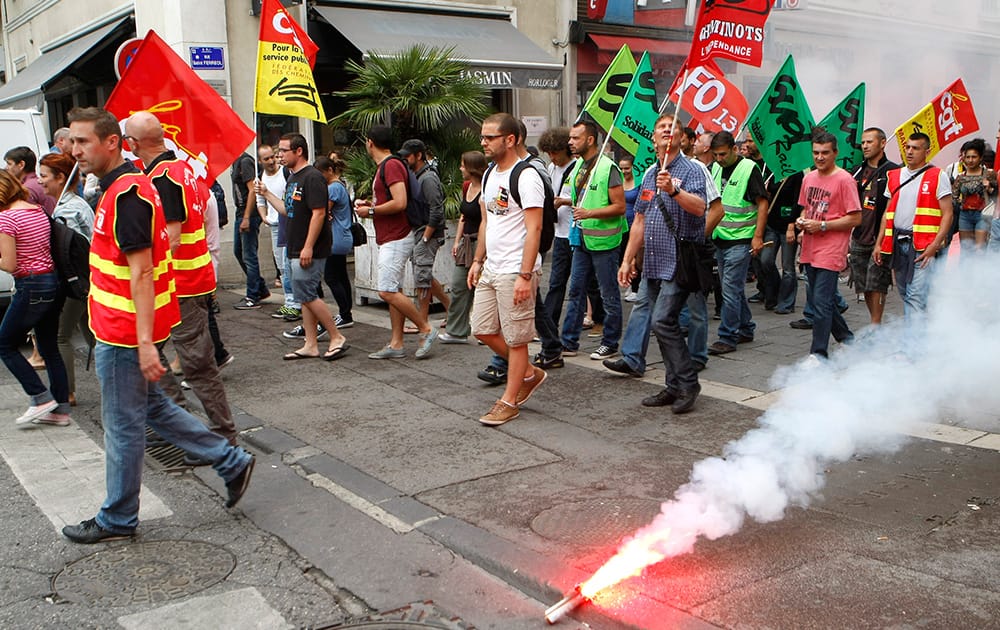 Workers of the French national railway SNCF demonstrate in the downtown of Marseille, southern France.