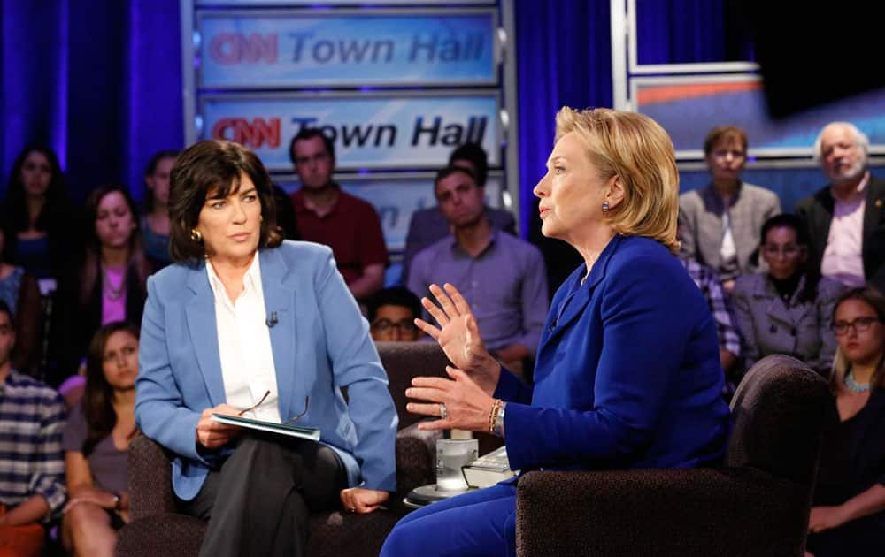 Hillary Rodham Clinton speaks during CNN`s Town Hall interview. The former secretary of state expressed caution Tuesday about the United States working with Iran to combat fast-moving Islamic insurgents in Iraq, saying the U.S. needs to understand `what we`re getting ourselves into.`