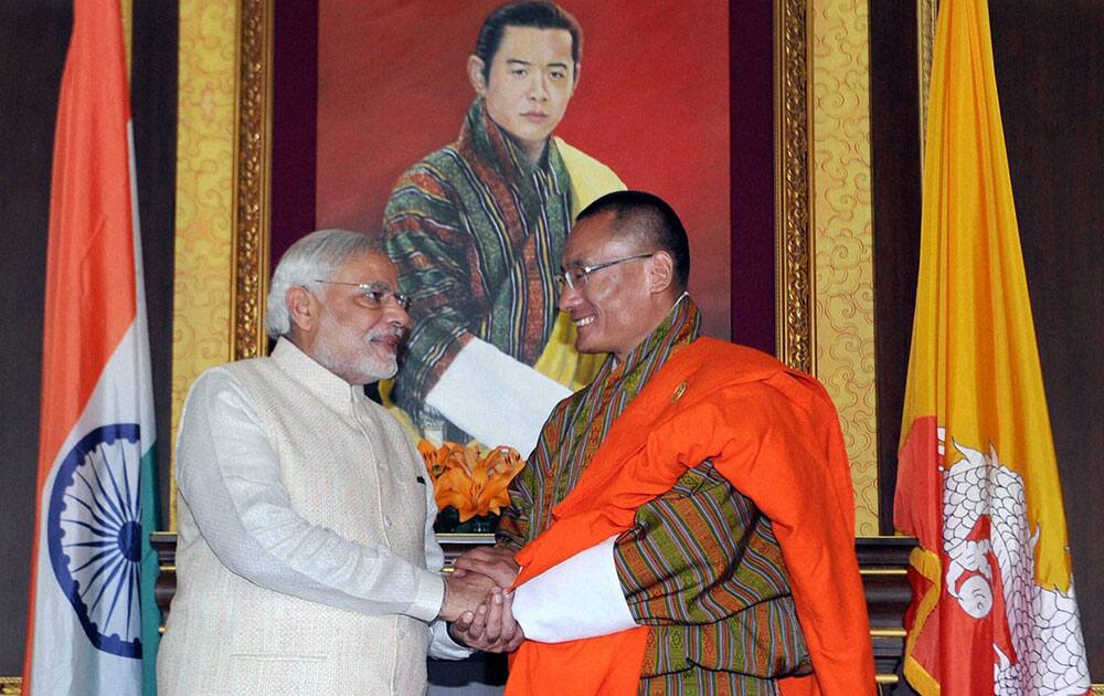 Prime Minister Narendra Modi with his Bhutanese counterpart Tshering Tobgay at a meeting in Thimphu.