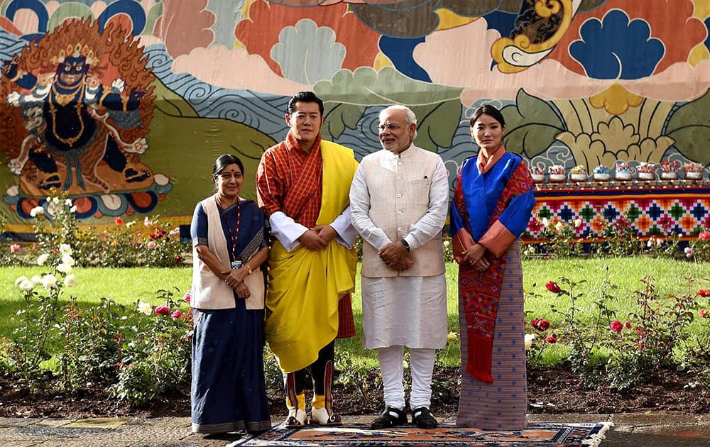 Prime Minister Narendra Modi, Bhutan King Jigme Khesar Namgyel Wangchuck, his Queen Jetsun Pema and External Affairs Minister Sushma Swaraj at a ceremonial reception at Royal Palace in Thimphu.