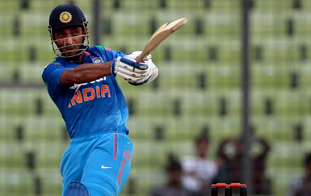 India`s Ajinkya Rahane plays a shot during their first one-day International cricket match against Bangladesh in Dhaka, Bangladesh.