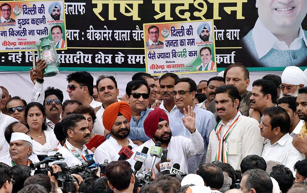 DPCC President Arvinder Singh Lovely along with Ajay Maken and other Congress leaders during a protest over electicity and water crises in New Delhi.