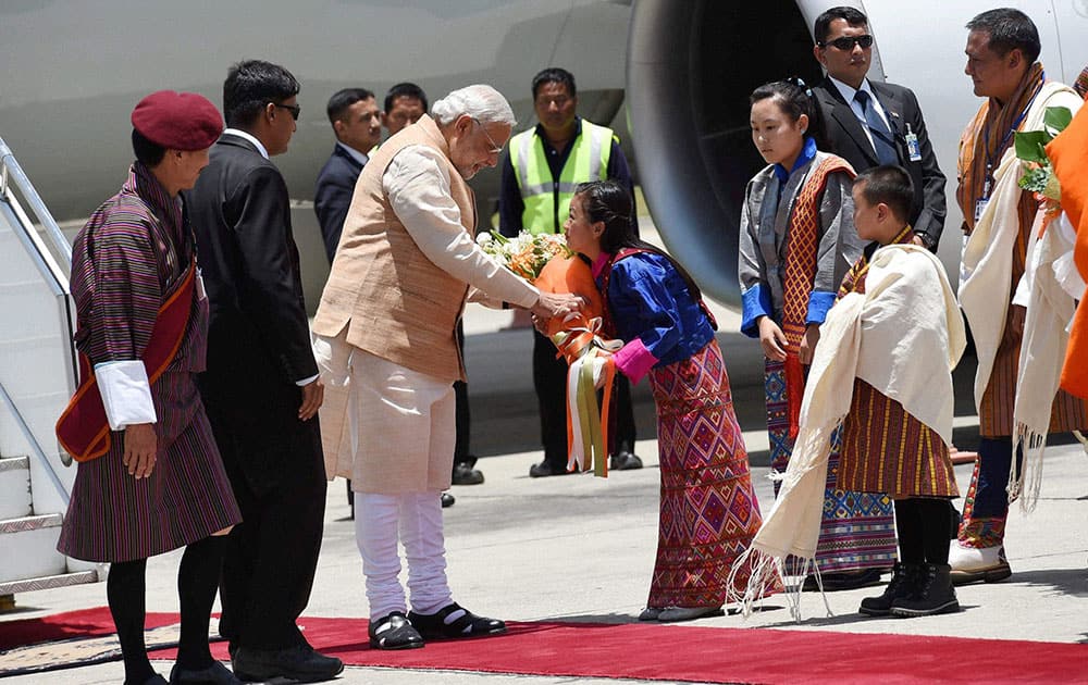 Prime Minister Narendra Modi being accorded traditional welcome on his arrival at the Paro International Airport in Bhutan.